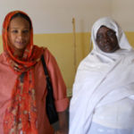 DKT's Dr. Hiba Omer and a village midwife.